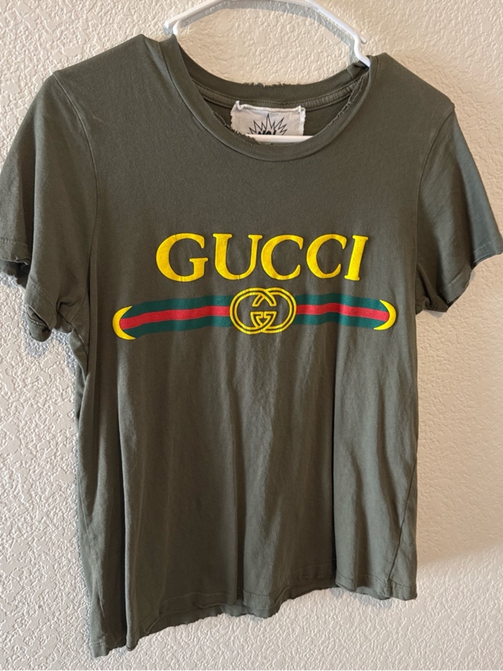 Olive Green Tee with Yellow Logo and Red-Green Stripe